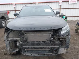 2025 Land Rover Range Rover Velar Dynamic SE z VIN SALYL2EX1SA397574, wystawiony jako IAAI lot #41707997 z przebiegiem 19 919 mil mil oraz . Historia ofert i sprzedaży dostępna na DreamBid. Obrazek 13.
