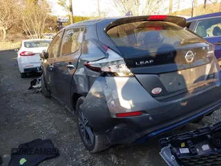 2021 Nissan LEAF SV with VIN 1N4AZ1CVXMC553479, listed as a IAAI auction lot 41452391 with 42,820 mi miles and . Bid and sale history available at DreamBid. Image 3.