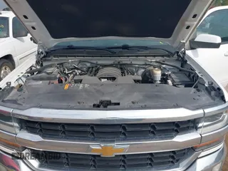2018 Chevrolet Silverado 1500 LT with VIN 1GCRCREC4JZ224584, listed as a IAAI auction lot 41552287 with 137,026 mi miles and . Bid and sale history available at DreamBid. Image 10.