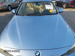 2013 BMW 3 Series 320i with VIN WBA3B1C56DK128089, listed as a IAAI auction lot 41332091 with 101,155 mi miles. Bid and sale history available at carsss.com. Image 5.