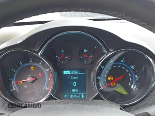 2014 Chevrolet Cruze LTZ z VIN 1G1PG5SB7E7335060, wystawiony jako IAAI lot #41710133 z przebiegiem 170 000 mil mil oraz . Historia ofert i sprzedaży dostępna na DreamBid. Obrazek 7.