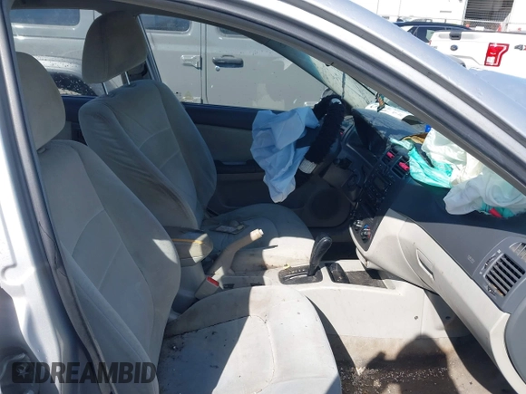 2006 Kia Spectra EX with VIN KNAFE121865313085, listed as a IAAI auction lot 41672712 with 248,959 mi miles. Bid and sale history available at carsss.com. Image 5.