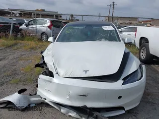 2024 Tesla Model 3 Long Range with VIN 5YJ3E1EB7RF854092, listed as a IAAI auction lot 41697646 with 7,371 mi miles and . Bid and sale history available at DreamBid. Image 12.