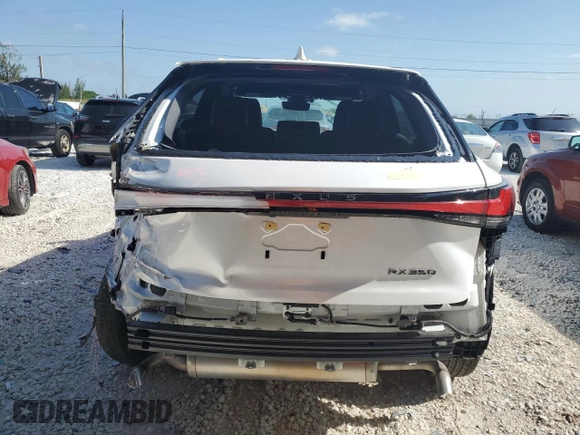 2023 Lexus RX with VIN 2T2BAMBA1PC022197, listed as a Copart auction lot 53846754 with 7,395 mi miles and Salvage Title. Bid and sale history available at carsss.com. Image 6.