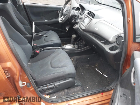 2010 Honda Fit Sport with VIN JHMGE8H63AS024532, listed as a IAAI auction lot 41469799 with 167,750 mi miles and . Bid and sale history available at DreamBid. Image 5.