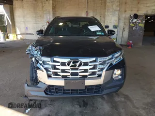 2022 Hyundai Santa Cruz SEL z VIN 5NTJCDAE7NH018858, wystawiony jako IAAI lot #42038182 z przebiegiem 28 596 mil mil oraz . Historia ofert i sprzedaży dostępna na DreamBid. Obrazek 13.