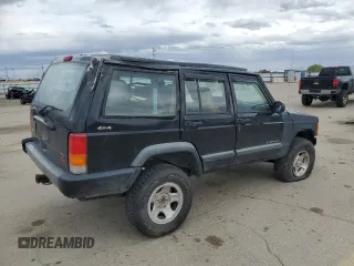 1998 Jeep Cherokee Sport with VIN 1J4FJ68S6WL188802, listed as a Copart auction lot 52094005 with 199,586 mi miles and Salvage Title. Bid and sale history available at carsss.com. Image 3.