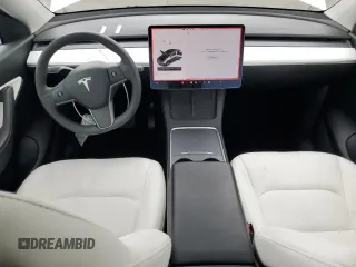 2021 Tesla Model Y Long Range with VIN 5YJYGDEEXMF151686, listed as a Copart auction lot 53903115 with 65,321 mi miles and Salvage Title. Bid and sale history available at DreamBid. Image 8.