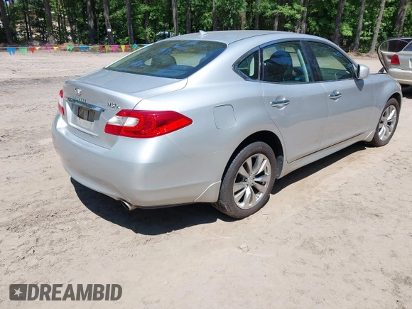 2012 Infiniti M with VIN JN1BY1AR4CM396809, listed as a IAAI auction lot 42394230 with 227,846 mi miles and . Bid and sale history available at DreamBid. Image 4.