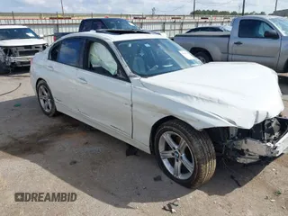 2014 BMW 3 Series 328i with VIN WBA3A5C59EP603197, listed as a IAAI auction lot 41503920 with 119,134 mi miles. Bid and sale history available at carsss.com. Image 1.
