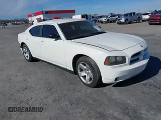 2009 Dodge Charger SE with VIN 2B3KA43V09H597634, listed as a IAAI auction lot 41332574 with 1 mi miles. Bid and sale history available at carsss.com. Image 1.