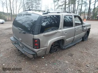 2003 Chevrolet Tahoe LT with VIN 1GNEC13Z73J206953, listed as a IAAI auction lot 41257879 with 186,590 mi miles. Bid and sale history available at carsss.com. Image 4.