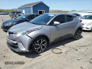 2018 Toyota C-HR XLE z VIN NMTKHMBX8JR001011, wystawiony jako Copart lot #55469265 z przebiegiem 106 938 mil mil oraz Szkoda całkowita • Salvage title. Historia ofert i sprzedaży dostępna na DreamBid. Obrazek 1.