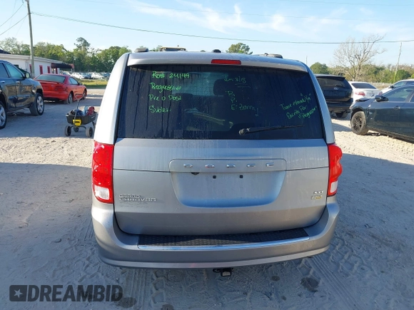 2018 Dodge Grand Caravan SXT with VIN 2C4RDGCG5JR267428, listed as a IAAI auction lot 41877661 with 103,633 mi miles and . Bid and sale history available at DreamBid. Image 17.