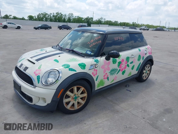 2012 MINI Hardtop S with VIN WMWSV3C54CTY17815, listed as a IAAI auction lot 42061906 with 72,393 mi miles and . Bid and sale history available at DreamBid. Image 2.