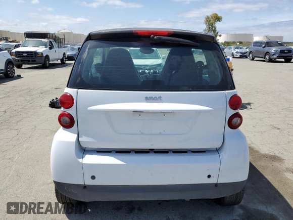 2012 Smart fortwo Pure z VIN WMEEJ3BA9CK561933, wystawiony jako Copart lot #53356835 z przebiegiem 67 587 mil mil oraz Nie do naprawy • Non repairable. Historia ofert i sprzedaży dostępna na DreamBid. Obrazek 6.