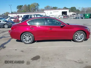 2015 Infiniti Q50 z VIN JN1BV7AR6FM420284, wystawiony jako IAAI lot #41795605 z przebiegiem 160 353 mil mil oraz . Historia ofert i sprzedaży dostępna na DreamBid. Obrazek 13.