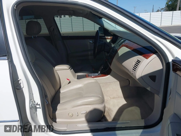 2007 Cadillac DTS Luxury I z VIN 1G6KD57Y77U133267, wystawiony jako IAAI lot #42337188 z przebiegiem 126 063 mil mil oraz . Historia ofert i sprzedaży dostępna na DreamBid. Obrazek 5.