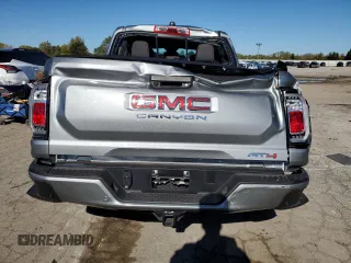 2024 GMC Canyon 4WD AT4 with VIN 1GTP6DEK8R1264699, listed as a Copart auction lot 76604464 with 2,406 mi miles and Salvage Title. Bid and sale history available at carsss.com. Image 6.