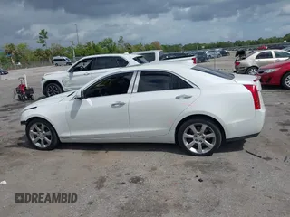 2016 Cadillac ATS Standard AWD z VIN 1G6AG5RX9G0106151, wystawiony jako IAAI lot #41710613 z przebiegiem 82 893 mil mil oraz . Historia ofert i sprzedaży dostępna na DreamBid. Obrazek 15.