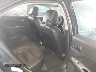 2012 Ford Fusion SEL z VIN 3FAHP0JG1CR352069, wystawiony jako IAAI lot #42182795 z przebiegiem 131 554 mil mil oraz . Historia ofert i sprzedaży dostępna na DreamBid. Obrazek 8.