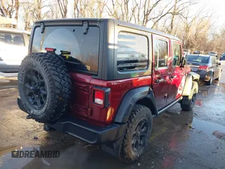 2022 Jeep Wrangler Unlimited Sport with VIN 1C4HJXDG1NW106171, listed as a IAAI auction lot 41357206 with 36,932 mi miles and . Bid and sale history available at DreamBid. Image 4.