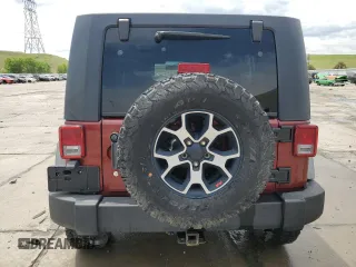 2010 Jeep Wrangler Unlimited Rubicon with VIN 1J4BA6H14AL115460, listed as a Copart auction lot 58349925 with Not provided miles and Salvage title. Bid and sale history available at DreamBid. Image 6.