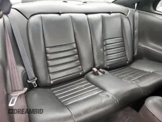 2004 Ford Mustang GT Deluxe z VIN 1FAFP42X74F232580, wystawiony jako Copart lot #55434075 z przebiegiem 83 948 mil mil oraz Szkoda całkowita • Salvage title. Historia ofert i sprzedaży dostępna na DreamBid. Obrazek 10.