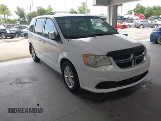 2014 Dodge Grand Caravan SXT z VIN 2C4RDGCG8ER181911, wystawiony jako IAAI lot #42400194 z przebiegiem 138 167 mil mil oraz . Historia ofert i sprzedaży dostępna na DreamBid. Obrazek 1.