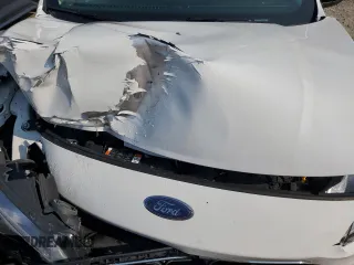 2022 Ford Escape SE с VIN 1FMCU9G68NUB51003, выставлен на аукционе Copart как лот 60502035 с пробегом 25 468 миль миль и Списание • Salvage title. История ставок и продаж доступна на DreamBid. Изображение 12.