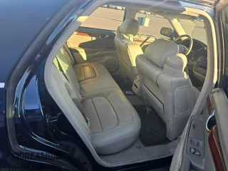 2004 Cadillac DeVille z VIN 1G6KD54Y64U133194, wystawiony jako Copart lot #82262914 z przebiegiem 148 721 mil mil oraz Czysty tytuł • Clean title. Historia ofert i sprzedaży dostępna na DreamBid. Obrazek 6.