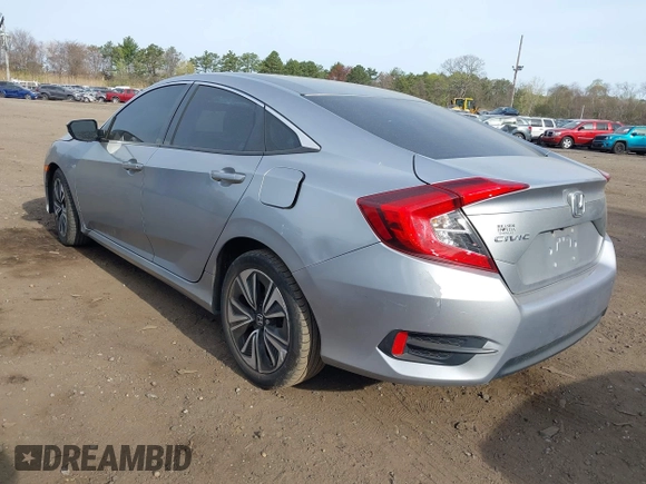 2018 Honda Civic Sedan LX with VIN 2HGFC2F5XJH573938, listed as a IAAI auction lot 42098109 with 69,037 mi miles. Bid and sale history available at carsss.com. Image 3.
