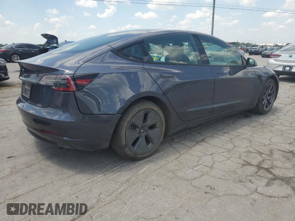 2023 Tesla Model 3 with VIN 5YJ3E1EA7PF576007, listed as a Copart auction lot 61674915 with 15,956 mi miles and Salvage title. Bid and sale history available at DreamBid. Image 3.
