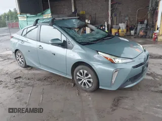 2021 Toyota Prius LE with VIN JTDL9MFU2M3030142, listed as a IAAI auction lot 42728956 with 60,729 mi miles and . Bid and sale history available at DreamBid. Image 1.
