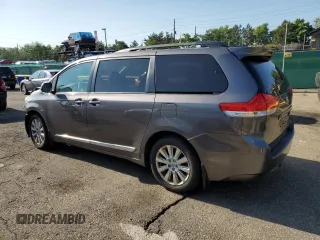 2014 Toyota Sienna Limited with VIN 5TDDK3DC8ES078175, listed as a Copart auction lot 61138585 with 98,527 mi miles and Salvage title. Bid and sale history available at DreamBid. Image 2.