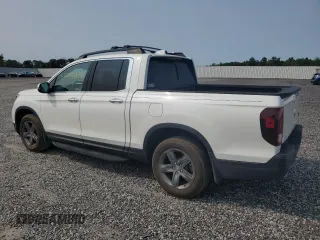 2022 Honda Ridgeline RTL-E with VIN 5FPYK3F70NB006495, listed as a Copart auction lot 57756735 with 43,874 mi miles and Salvage title. Bid and sale history available at DreamBid. Image 2.