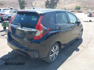 2015 Honda Fit EX-L z VIN 3HGGK5H88FM706513, wystawiony jako IAAI lot #42493772 z przebiegiem 173 129 mil mil oraz . Historia ofert i sprzedaży dostępna na DreamBid. Obrazek 4.