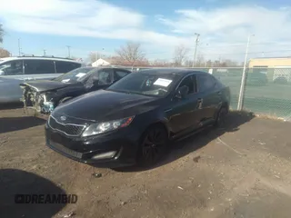 2012 Kia Optima SX with VIN 5XXGR4A68CG001270, listed as a IAAI auction lot 34862669 with 180,039 mi miles and . Bid and sale history available at carsss.com. Image 2.