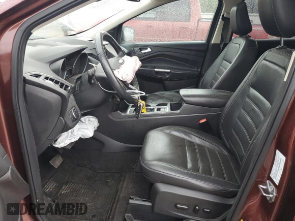 2018 Ford Escape Titanium z VIN 1FMCU0J93JUA70449, wystawiony jako Copart lot #59303245 z przebiegiem 165 907 mil mil oraz Szkoda całkowita • Salvage title. Historia ofert i sprzedaży dostępna na DreamBid. Obrazek 7.