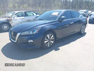 2019 Nissan Altima 2.5 Platinum with VIN 1N4BL4FV2KC113644, listed as a IAAI auction lot 41751975 with 125,617 mi miles. Bid and sale history available at carsss.com. Image 2.