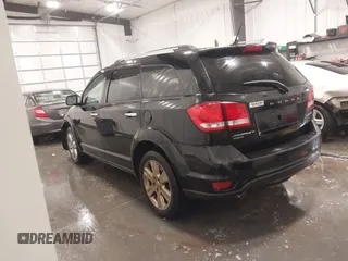 2014 Dodge Journey Limited with VIN 3C4PDDDG7ET154300, listed as a IAAI auction lot 41640132 with 175,276 mi miles and . Bid and sale history available at DreamBid. Image 3.