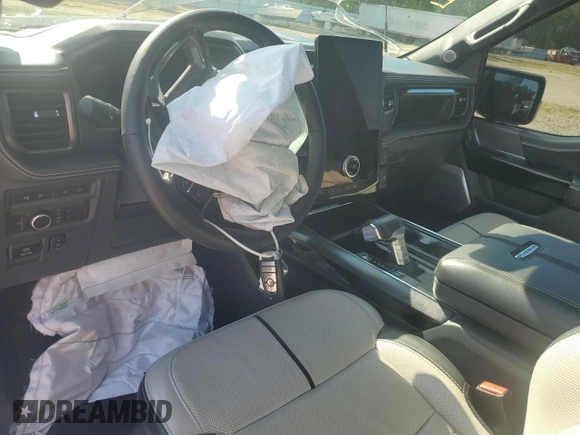 2022 Ford F-150 Lightning Pro z VIN 1FT6W1EV7NWG10601, wystawiony jako Copart lot #55057445 z przebiegiem Nie podano mil oraz Szkoda całkowita • Salvage title. Historia ofert i sprzedaży dostępna na DreamBid. Obrazek 8.