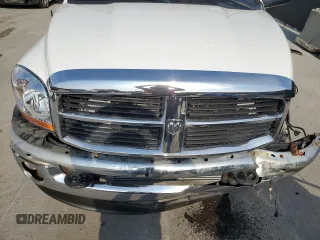 2006 Dodge 2500 SLT z VIN 1D7KS28C76J149088, wystawiony jako Copart lot #58035905 z przebiegiem 157 819 mil mil oraz Szkoda całkowita • Salvage title. Historia ofert i sprzedaży dostępna na DreamBid. Obrazek 11.