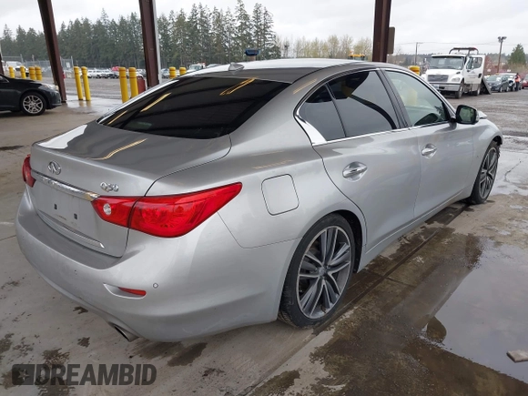 2014 Infiniti Q50 Sport with VIN JN1BV7APXEM670849, listed as a IAAI auction lot 41939363 with 124,766 mi miles and . Bid and sale history available at DreamBid. Image 4.
