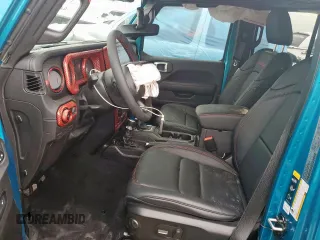 2024 Jeep Wrangler Rubicon X with VIN 1C4RJXFG1RW180410, listed as a Copart auction lot 58039785 with 3,381 mi miles and Salvage title. Bid and sale history available at DreamBid. Image 7.