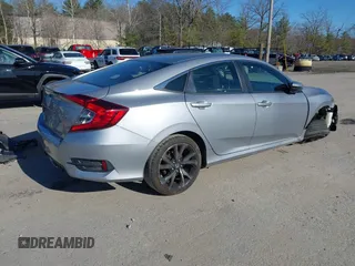 2019 Honda Civic Sport with VIN 2HGFC2F8XKH602463, listed as a IAAI auction lot 41966052 with 95,416 mi miles and . Bid and sale history available at DreamBid. Image 4.