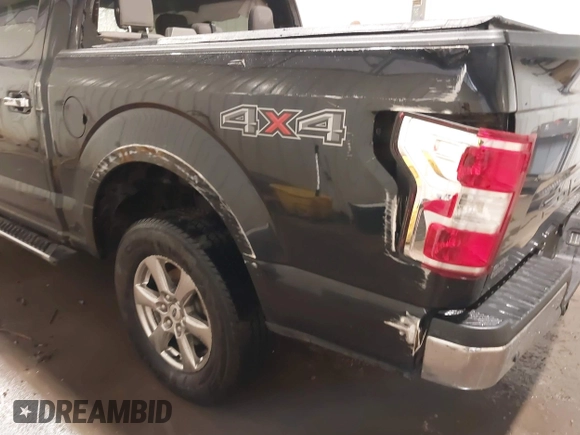 2018 Ford F-150 XL with VIN 1FTEW1EP1JKF22383, listed as a IAAI auction lot 42316339 with 113,052 mi miles and . Bid and sale history available at DreamBid. Image 13.