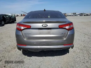 2013 Kia Optima SX с VIN 5XXGR4A63DG152535, выставлен на аукционе Copart как лот 63614895 с пробегом 172 394 миль миль и Списание • Salvage title. История ставок и продаж доступна на DreamBid. Изображение 6.