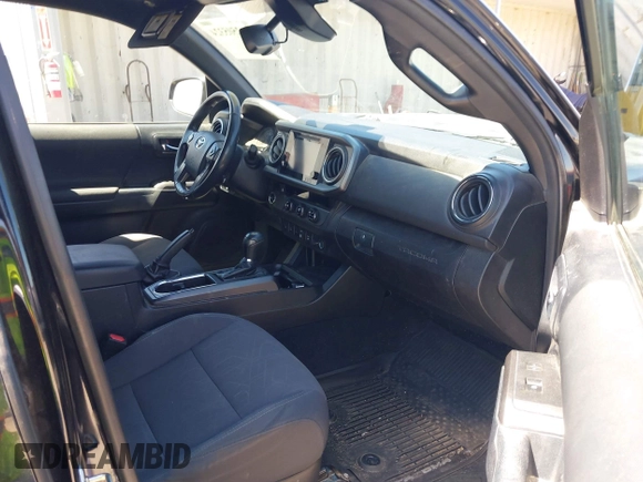 2018 Toyota Tacoma SR5 with VIN 3TMBZ5DN1JM014540, listed as a IAAI auction lot 42505324 with 112,990 mi miles and . Bid and sale history available at DreamBid. Image 5.