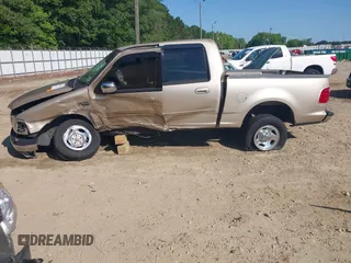 2001 Ford F-150 XLT with VIN 1FTRW07W11KD96140, listed as a IAAI auction lot 42331842 with Not provided miles and . Bid and sale history available at DreamBid. Image 6.